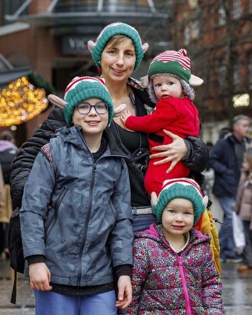 Elves, Jemma Knox with her children Elliot 8, Constance 3 and Austin 8 months out shopping for Christmas gifts in Belfast before heading to W5.