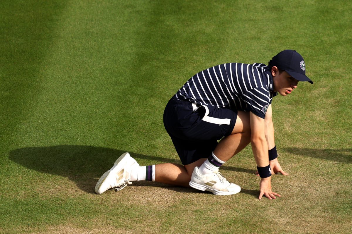 Breaking news conference podium with microphones and news outlet logos, focusing on current events and media coverage