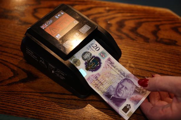 A machine used to check counterfeit banknotes in the Royal Oak pub on County Road.