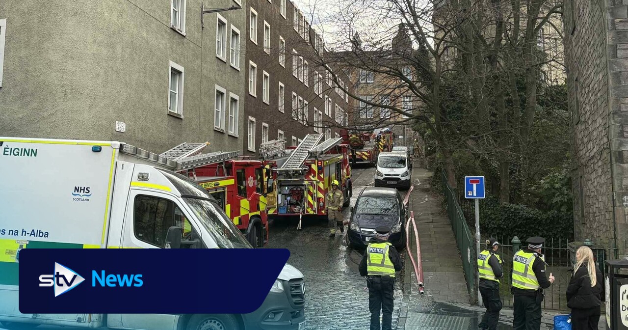 Firefighter among two injured after fire rips through Edinburgh flat