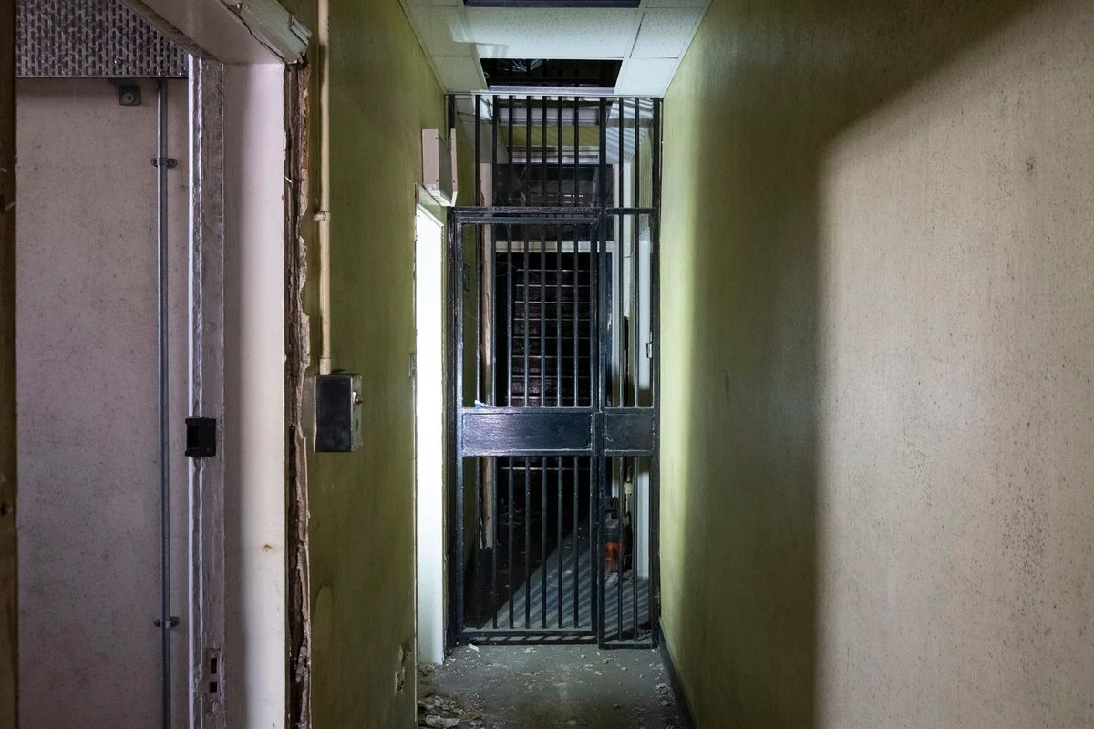 Photographs of a former police station and law courts in Prescot