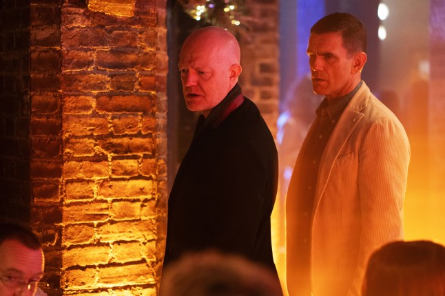 Jack watches Max argue with someone in EastEnders