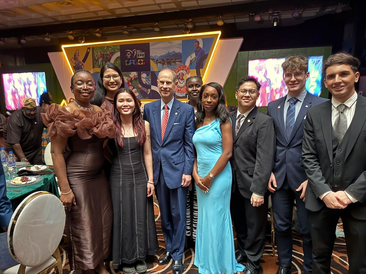 A group of people stand together.