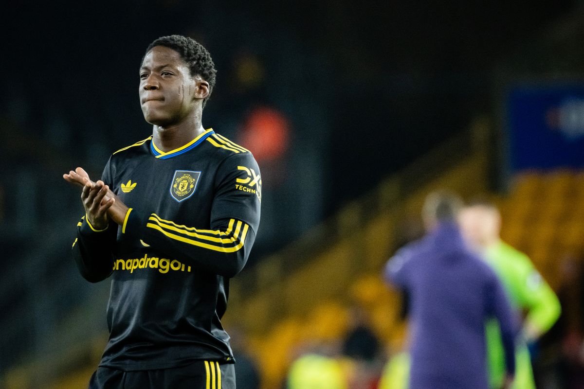 Kobbie Mainoo applauds the fans at the end of the Premier League match between Wolverhampton Wanderers and Manchester United at Molineux.