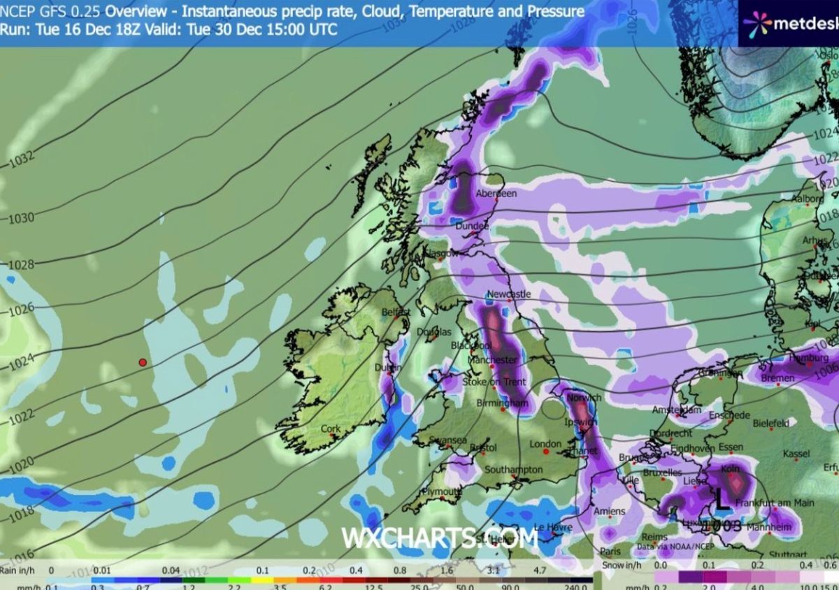 A map of the British Isles shaded purple to show the arrival of snowfall