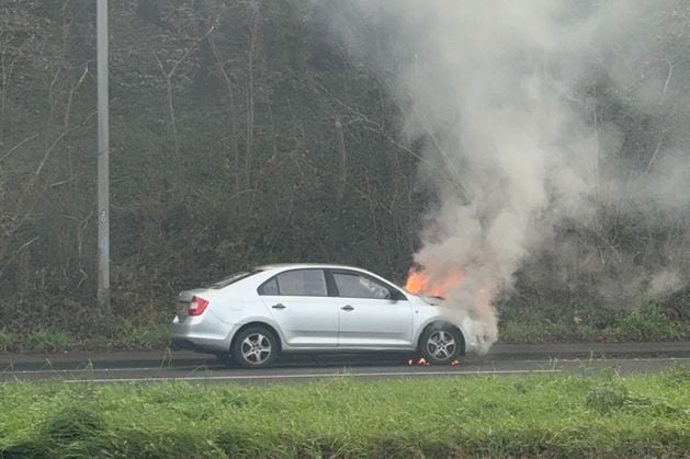 A2 Belfast Road towards the city, close to the Tesco store at Knocknagoney: Car on fire causing traffic disruption