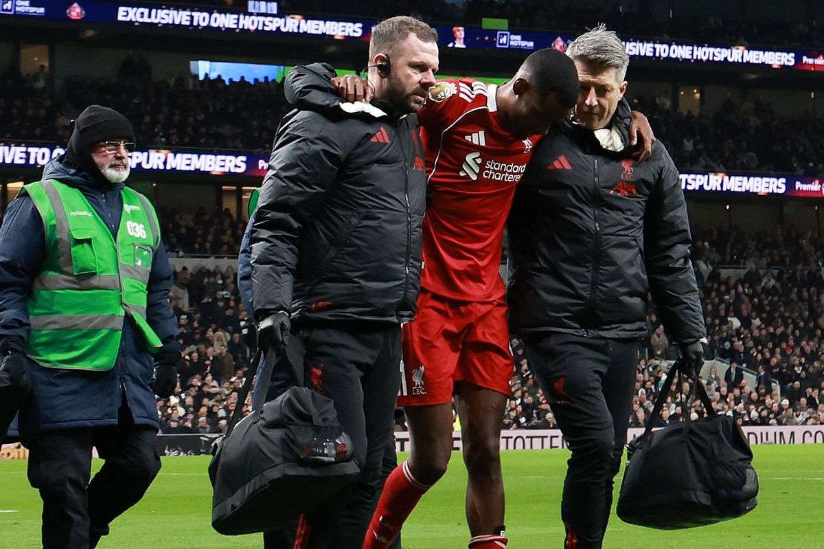 Alexander Isak is helped off after picking up an injury during Liverpool's game against Tottenham