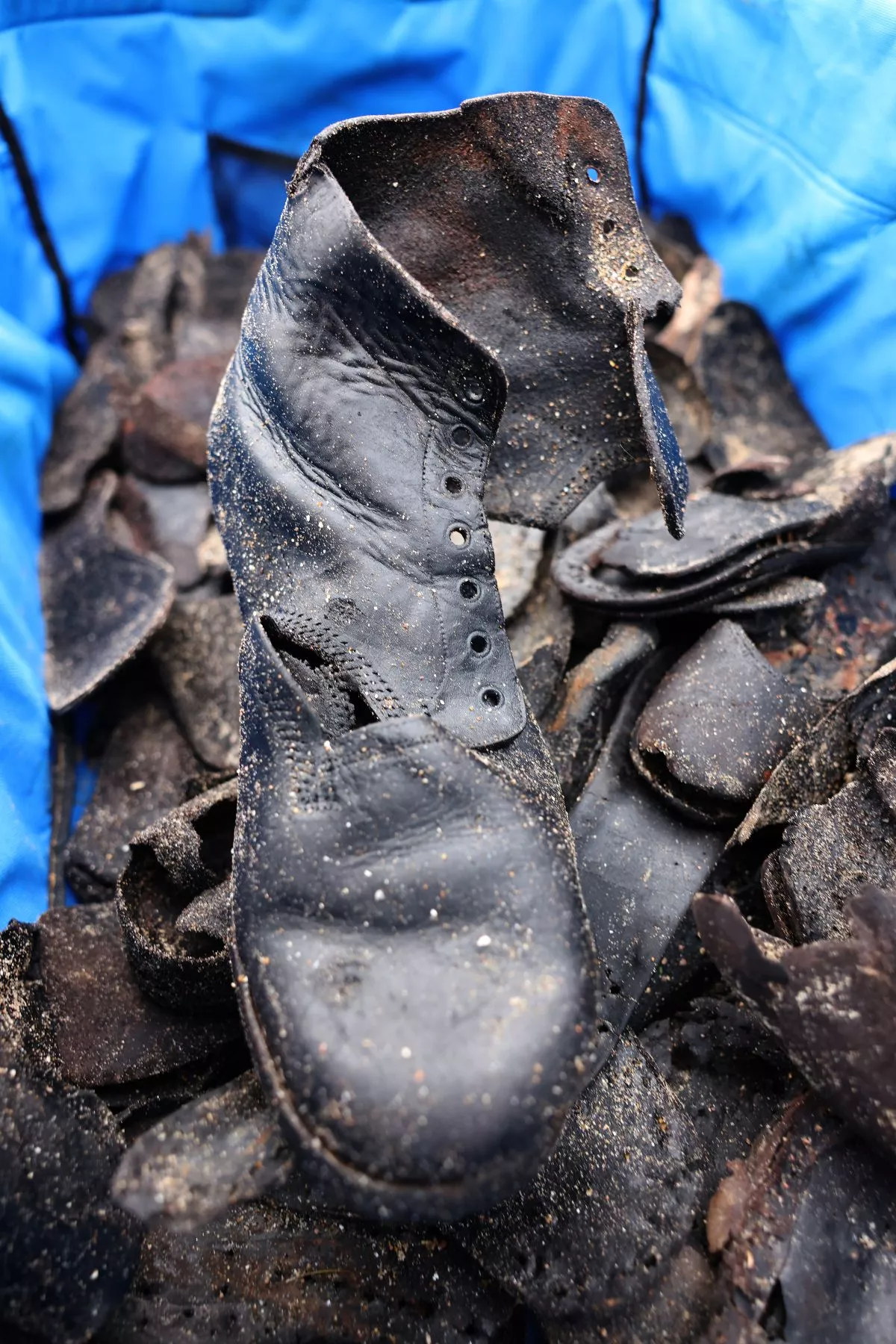 Some old shoes in a bag