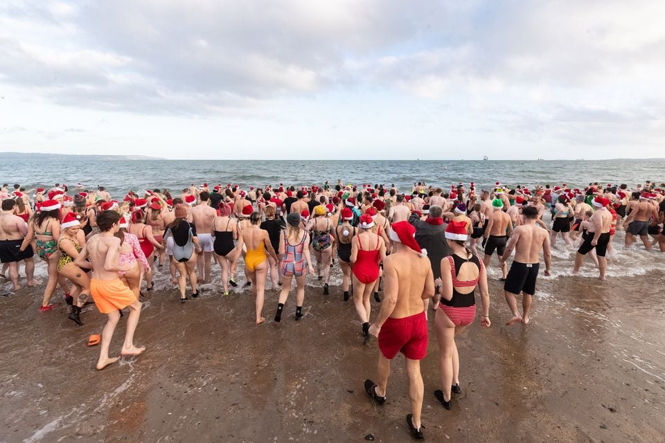 The Christmas Eve dip at Helen’s Bay. Photo: Luke Jervis/Belfast Telegraph