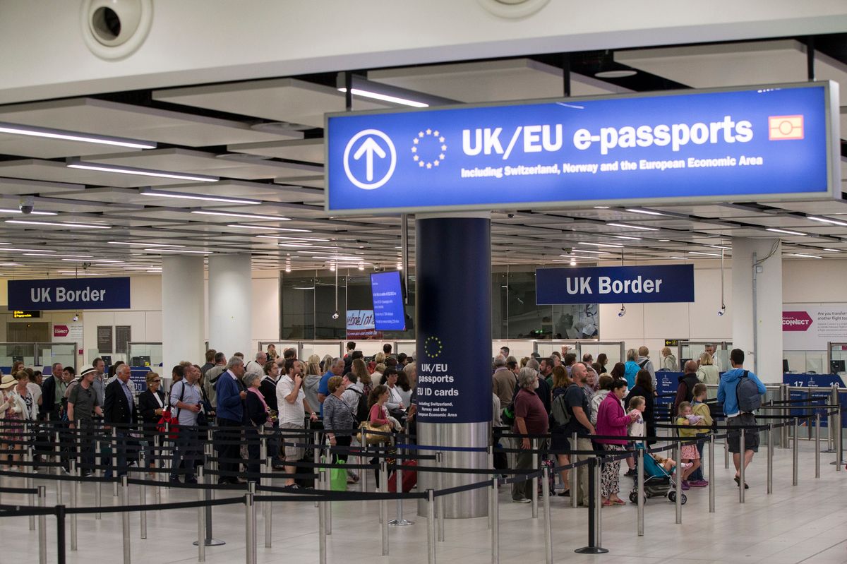 A border control queue at an airport