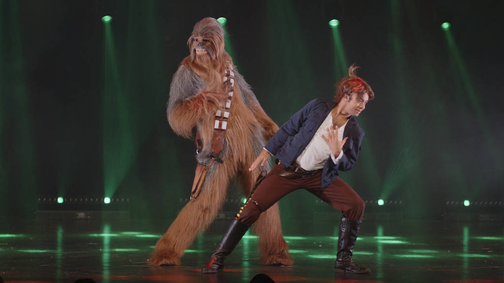 performers dressed as Chewbacca and Han Solo dance at The Empire Strips Back