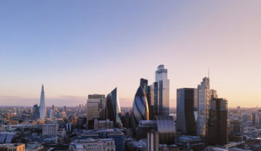 Elevated view over London's city financial district skyline at sunset