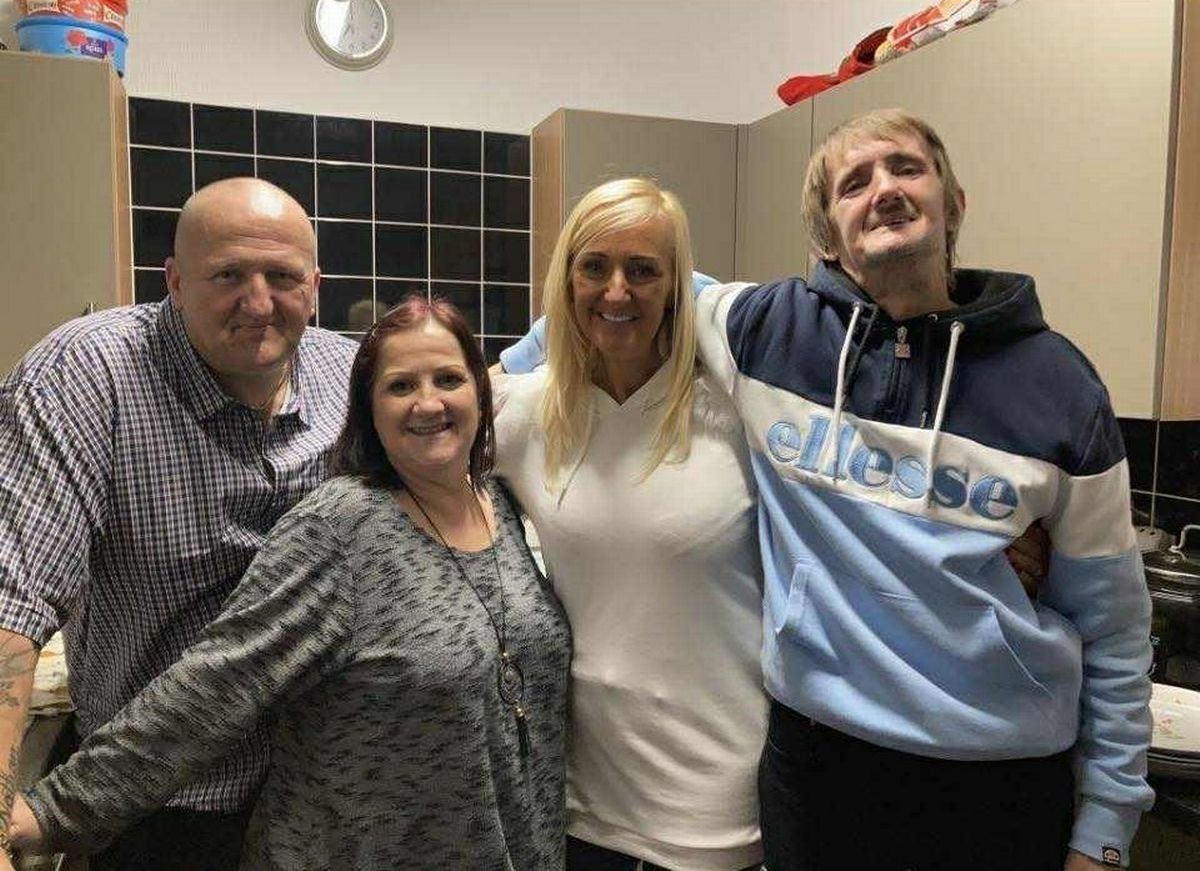 Simon Coombes (R) with brother David and sister Kim and Louise