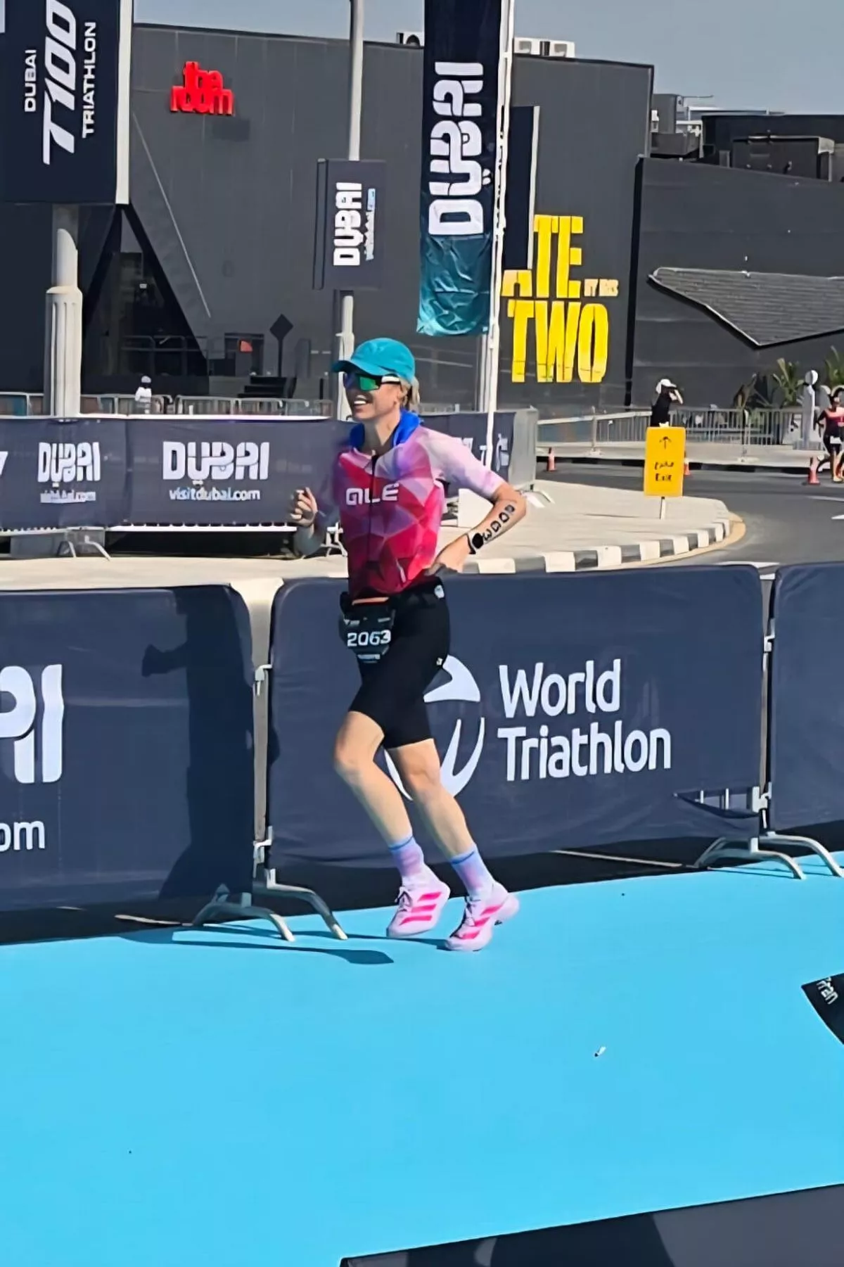 A woman running in a triathlon
