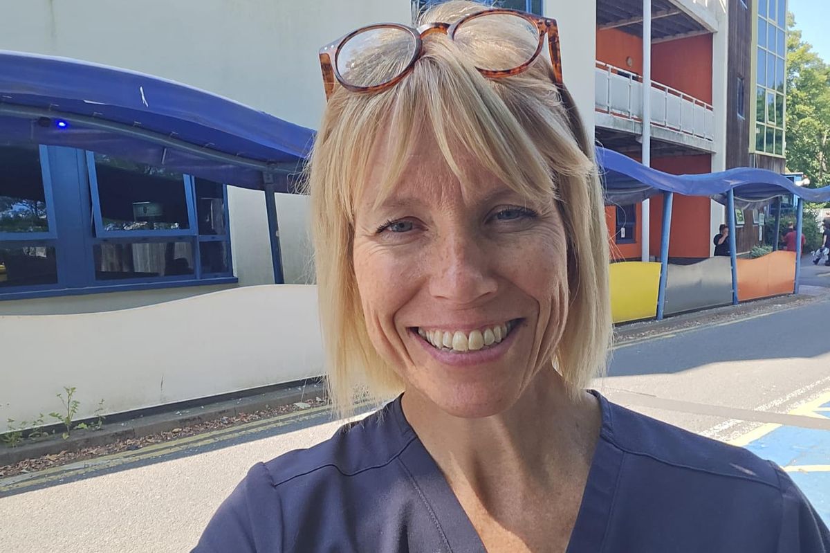 A smiling doctor in a hospital