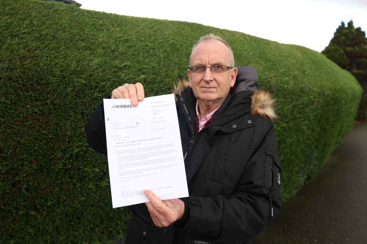 Clive Patterson with the letter he received from Wirral Council, outside his home on Old Wood Road in Pensby
