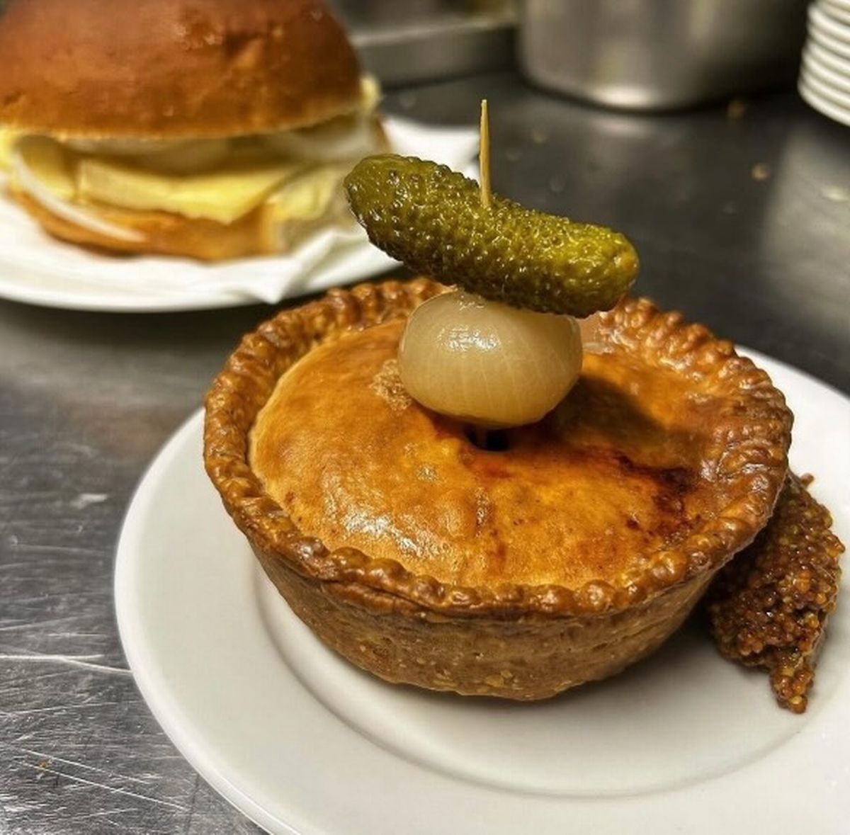 Home made pork pies and scotch eggs are being served alongside top cobs