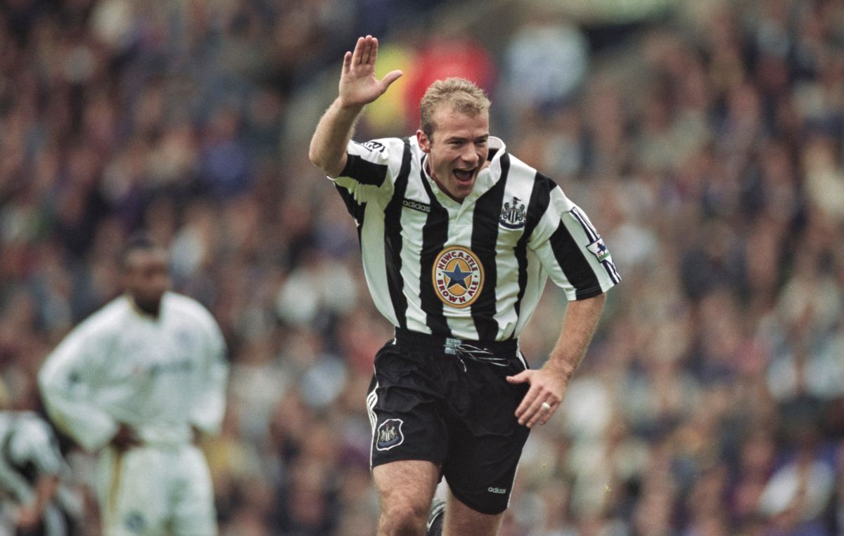 Alan Shearer celebrates with his trademark one armed salute after a goal for Newcastle