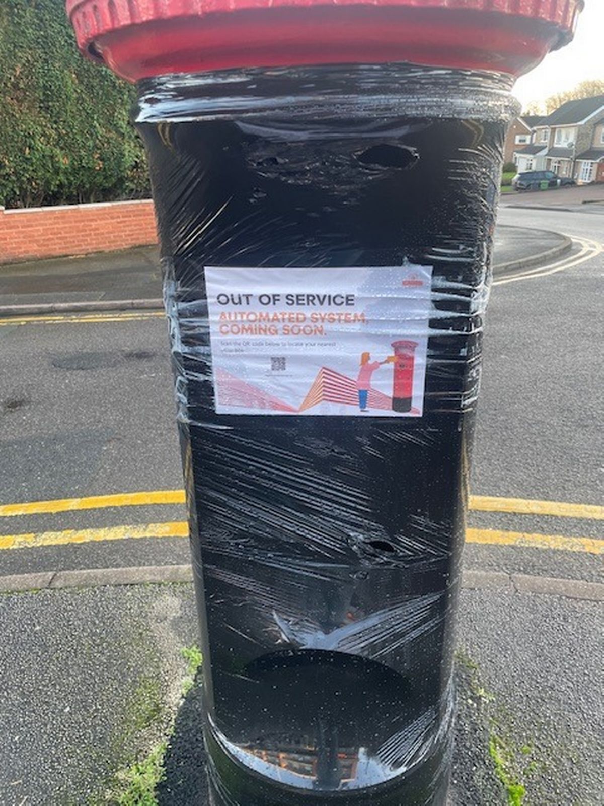 A taped up postbox in Boundary Road Streetly awaits upgrading