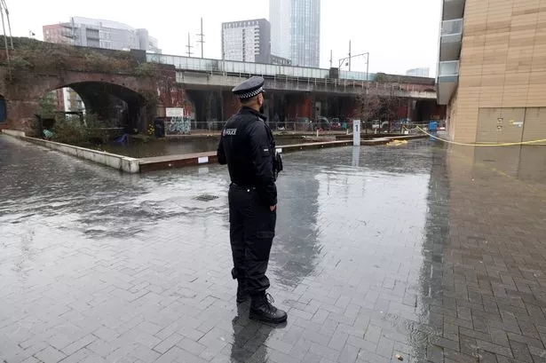 Police at a scene on Kelso Place, Castlefield