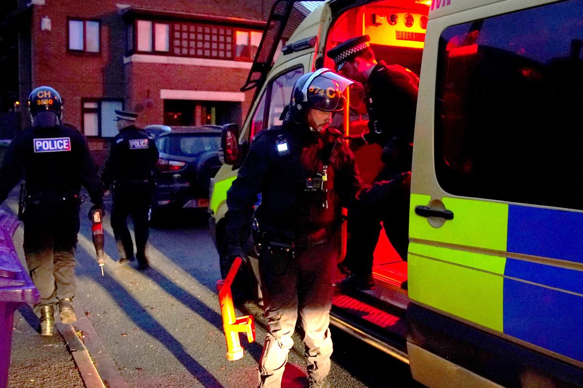 Officers from Merseyside Police conduct a raid in Liverpool. Generic image. 