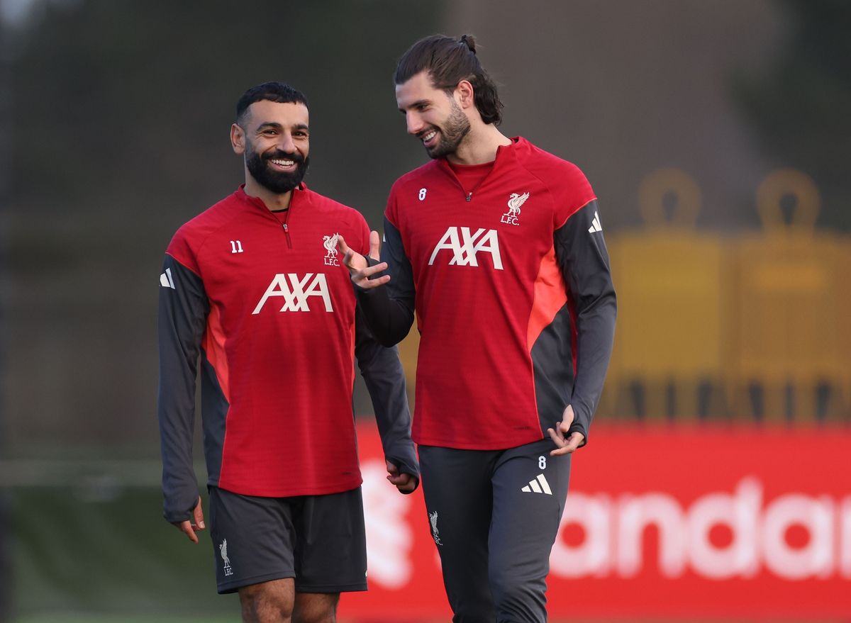 Mo Salah and Dominik Szoboszlai of Liverpool FC look happy during a training session