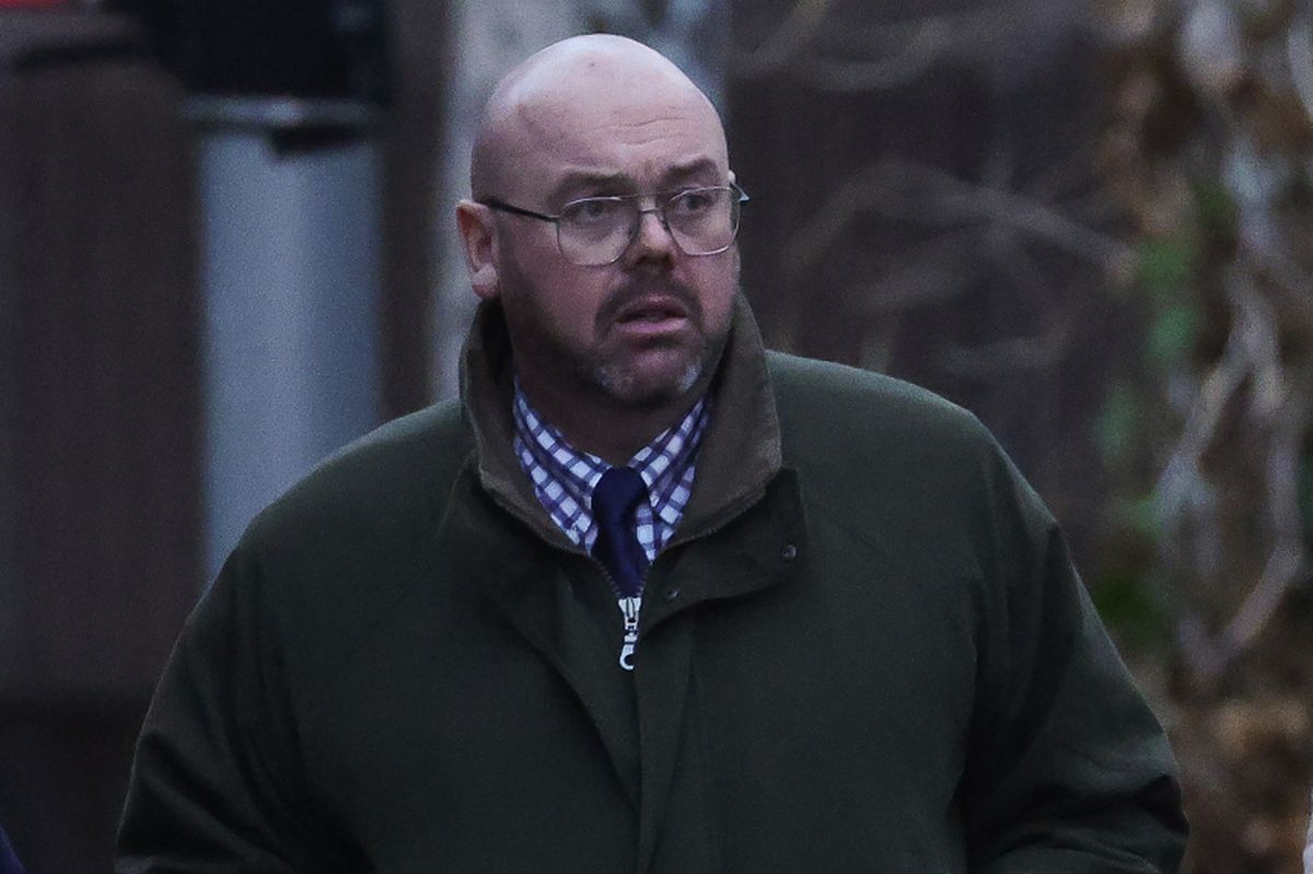 Stephen McGuigan leaving court in Liverpool