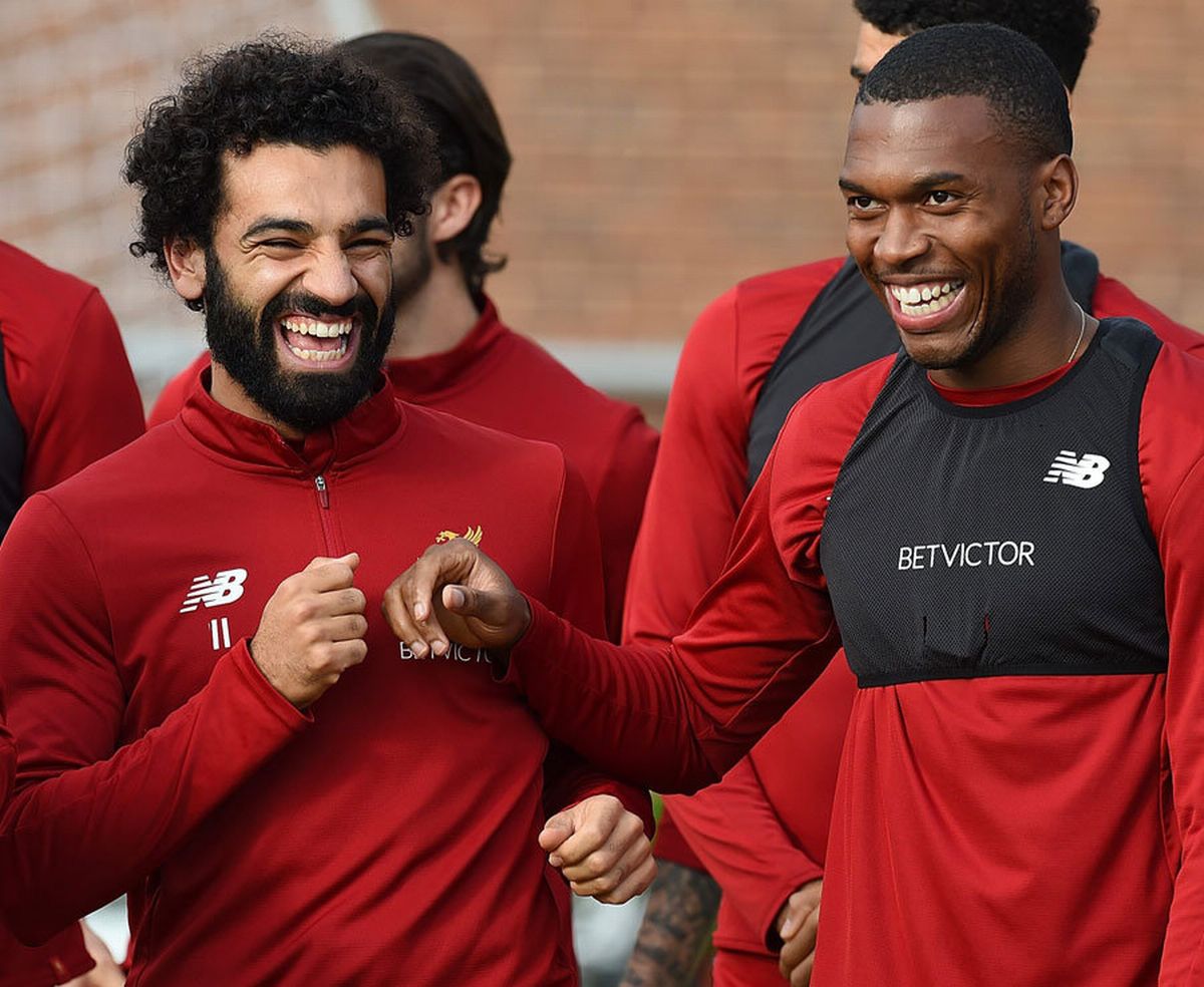 Mohamed Salah (left) and Daniel Sturridge smile in training