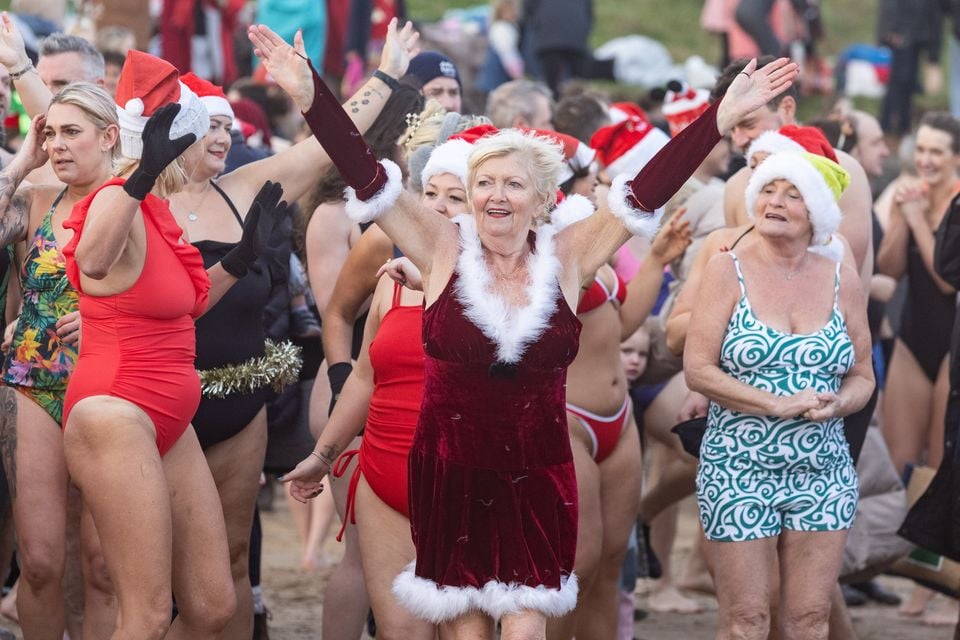 The Christmas Eve dip at Helen’s Bay. Photo: Luke Jervis/Belfast Telegraph