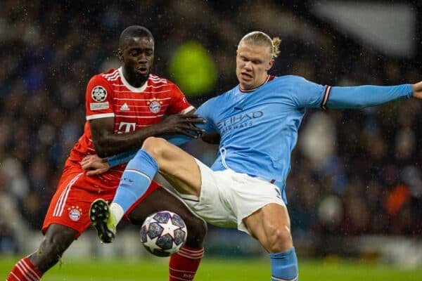 MANCHESTER, ENGLAND - Tuesday, April 11, 2023: Manchester City's Erling Haaland (R) is challenged by Bayern Munich's Dayot Upamecano during the UEFA Champions League Quarter-Final 1st Leg match between Manchester City FC and FC Bayern Munich at the City of Manchester Stadium. (Pic by David Rawcliffe/Propaganda)
