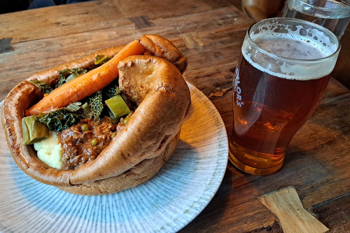 Tan Hill Inn's giant Yorkshire with lamb and a pint of bitter