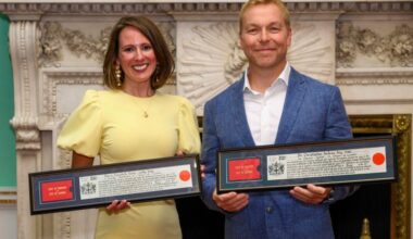 Chris Hoy delivering keynote speech at business conference, June 2025, addressing industry leaders and professionals.