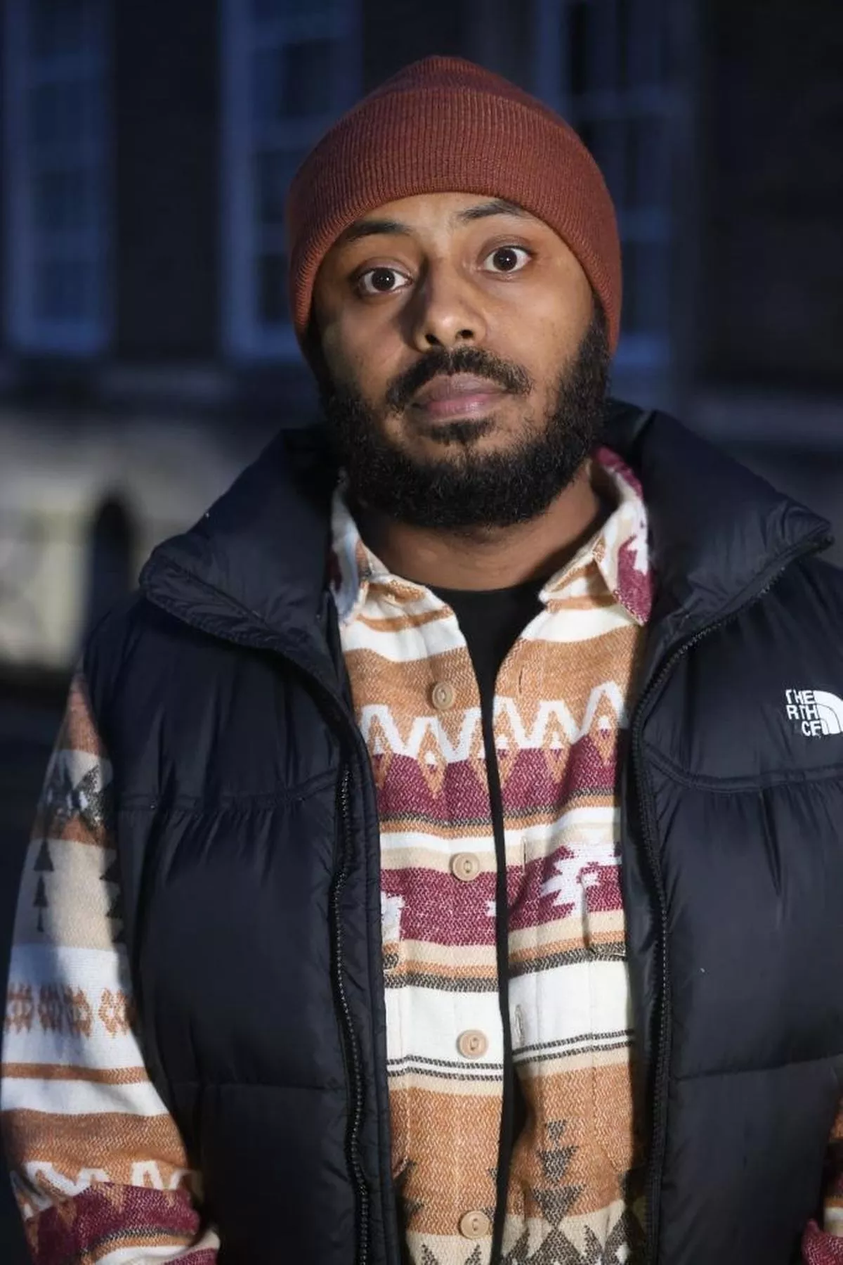 Shaban Ali at a meeting of council chiefs and residents of Barton House in Bristol