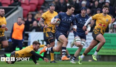 Matias Moroni (third right) runs with the ball in his hand as a Newcastle player falls behind him trying to make a tackle