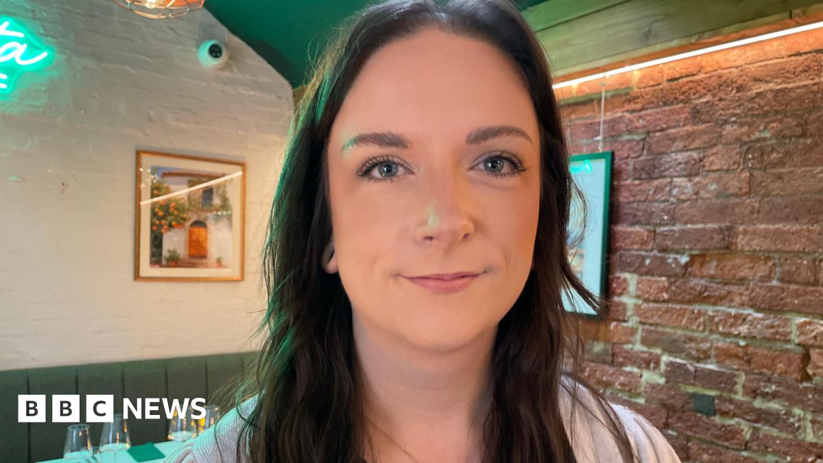 Young woman with long dark hair in a restaurant