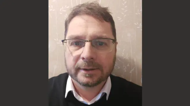 Headshot of David Clarke