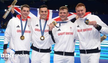 Great Britain's Duncan Scott, James Guy, Matthew Richards and Tom Dean pose with their gold medals
