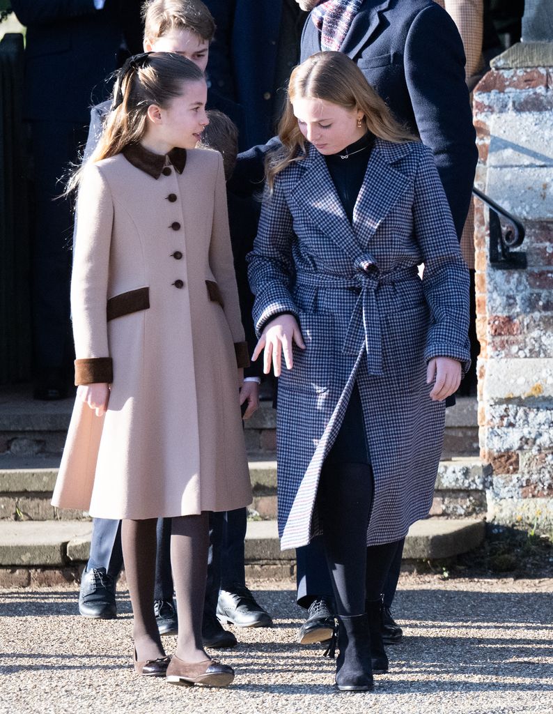 Princess Charlotte talking to Mia Tindall