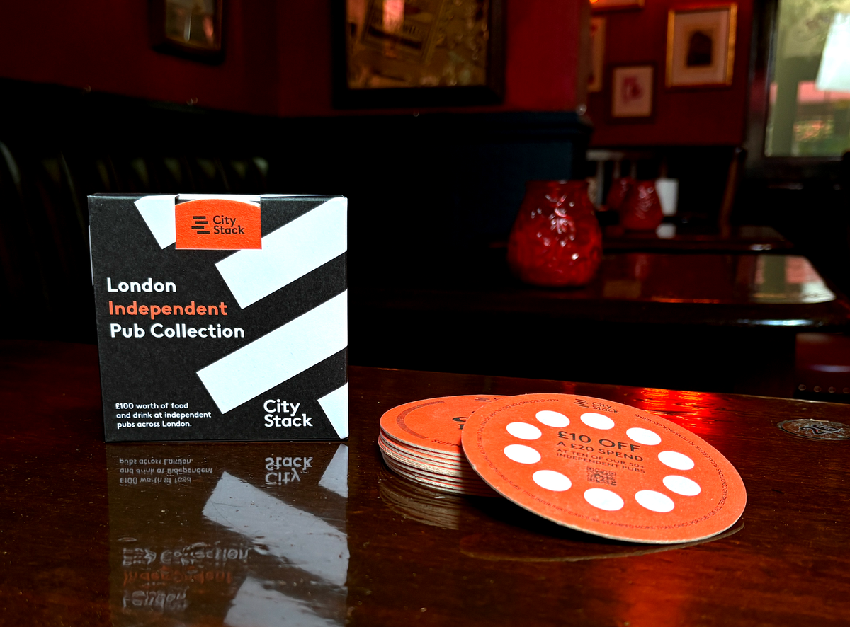CityStack pub discounts beer mats on a pub table
