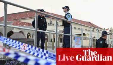 Bondi beach shooting live updates: alleged shooters in terror attack were father and son; police say two active explosives found at scene | Bondi beach terror attack