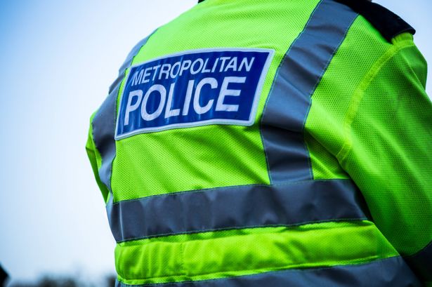 Back view of a metropolitan police officer.