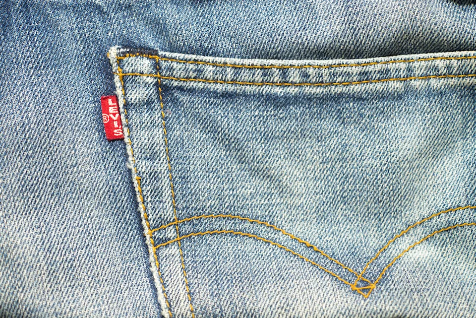 Close-up of a Levi's jeans back pocket with visible stitching and brand label, relevant to fashion or apparel discussions