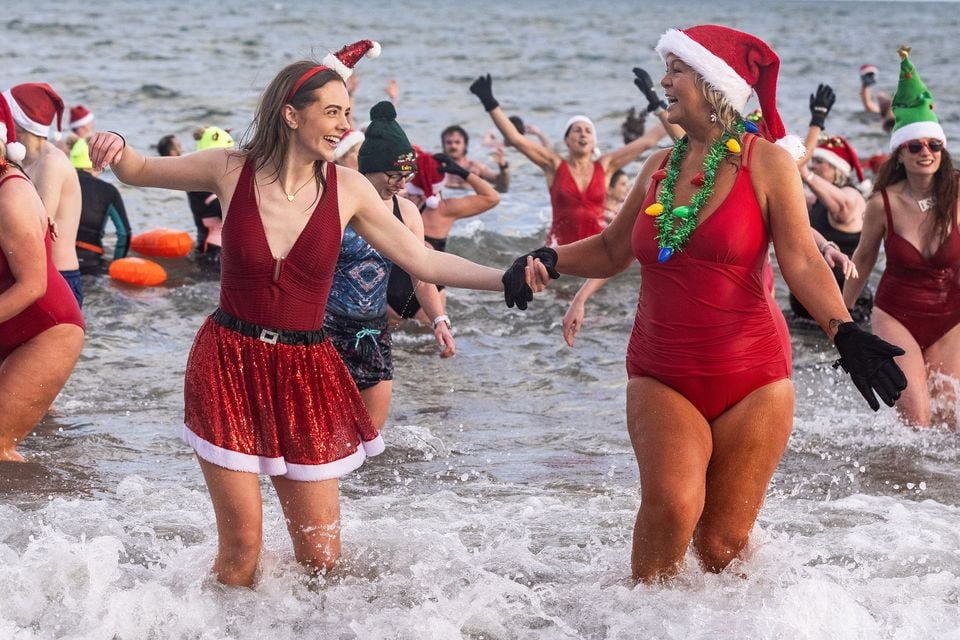 The Christmas Eve dip at Helen’s Bay. Photo: Luke Jervis/Belfast Telegraph