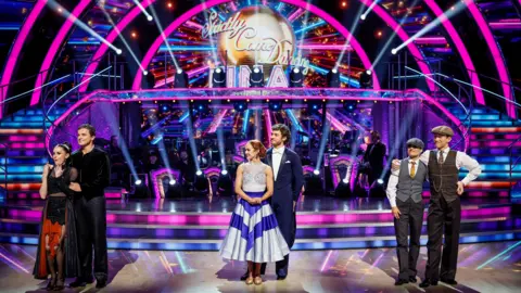Finalists L-R Amber Davies and Nikita Kuzmin, George Clarke and Alexis Warr and Karen Carney and Carlos Gu, during the live show on BBC1's Strictly Come Dancing