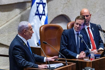 Prime Minister Benjamin Netanyahu (left) and President Issac Herzog (right) at the opening of the winter assembly of the Knesset plenum in Jerusalem, October. Credit: Olivier Fitoussi Prime Minister Benjamin Netanyahu (left) and President Issac Herzog (right) at the opening of the winter assembly of the Knesset plenum in Jerusalem, October.