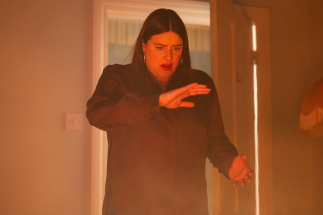 Zoe Slater facing a fire in EastEnders