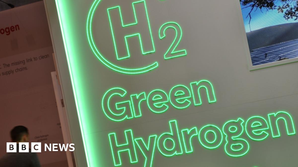 An electrolyser sits on a production line at Quest One's factory. It's rectangular in shape, about the size of a shopping basket with a metal grid around the outside.