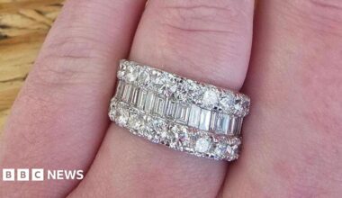 A picture of the ring that was stolen. It is a large ring with a number of diamonds in it and silver in colour.