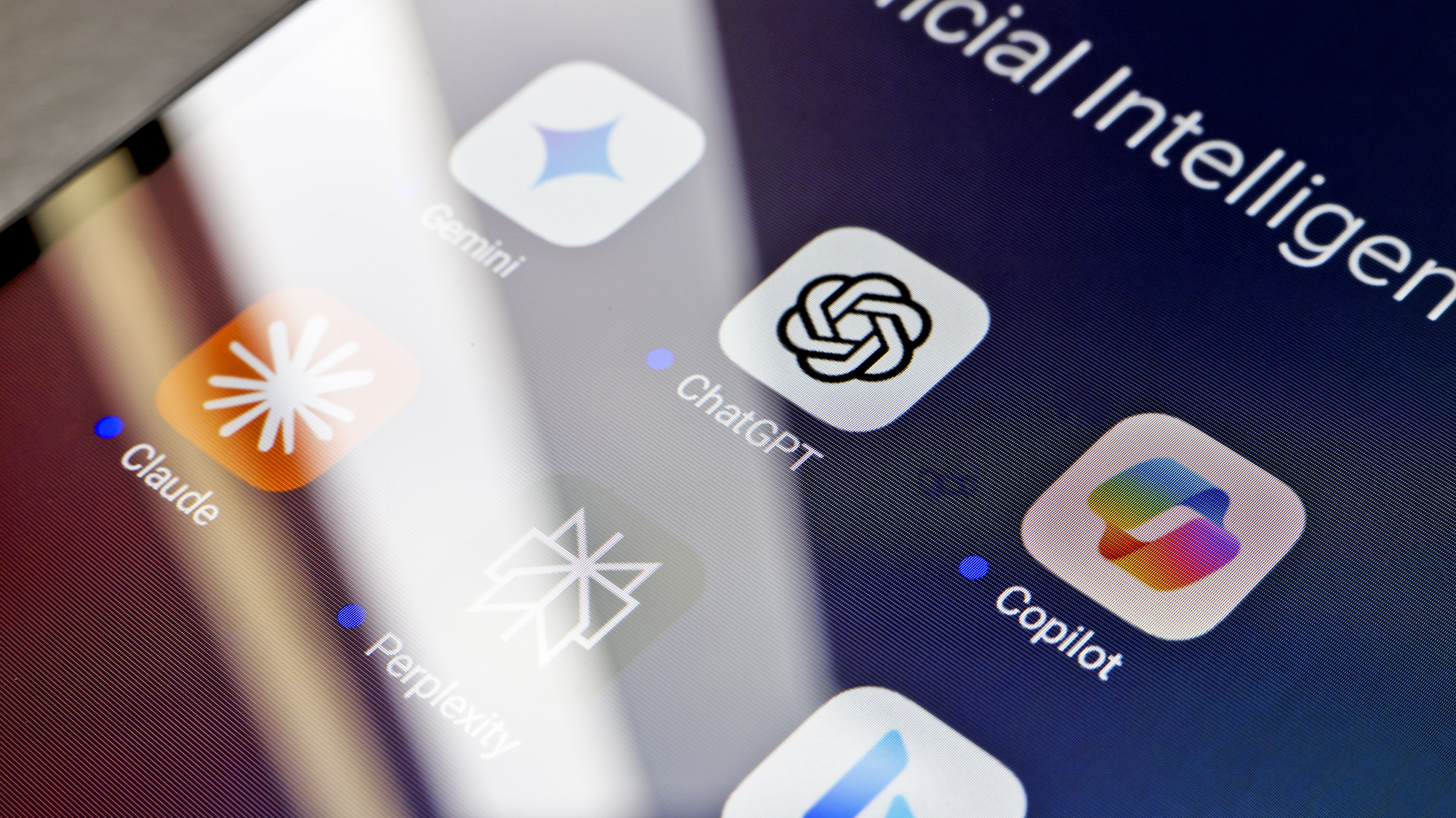 The logos of Google Gemini, ChatGPT, Microsoft Copilot, Claude by Anthropic, Perplexity, and Bing apps are displayed on the screen of a smartphone in Reno, United States, on November 21, 2024. (Photo by Jaque Silva/NurPhoto via Getty Images)