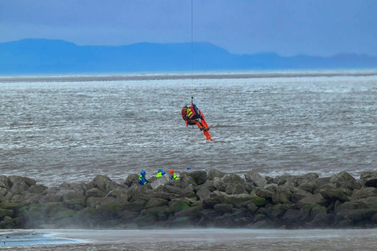 Two swimmers had to be air-lifted to safety